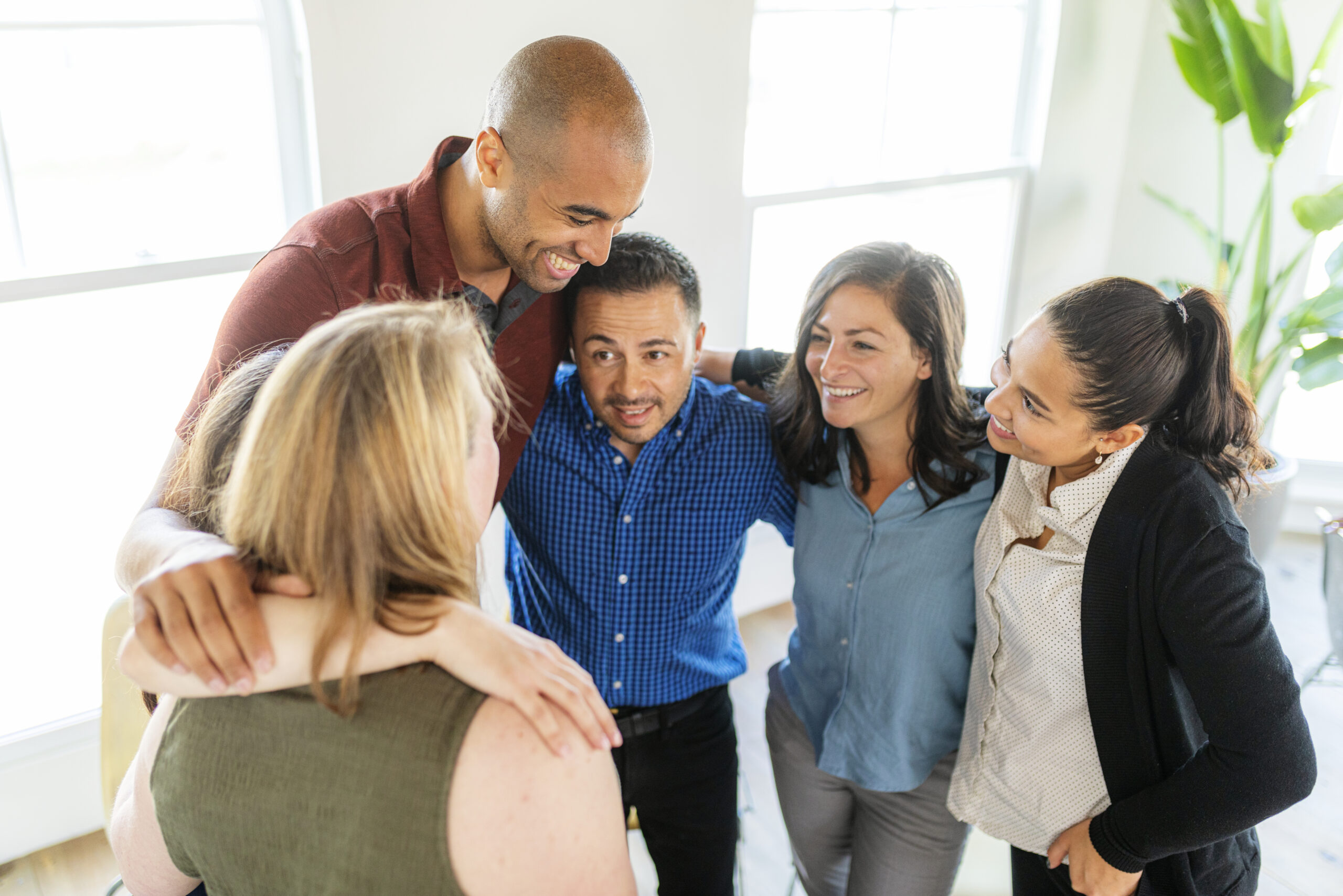 Diverse people in a support group session